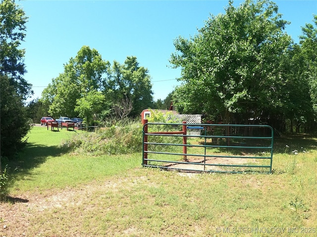808 N Norfolk Rd, Yale, OK 74085 - gate with a yard
