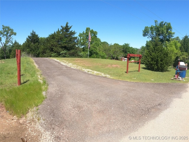808 N Norfolk Rd, Yale, OK 74085 - view of asphalt road