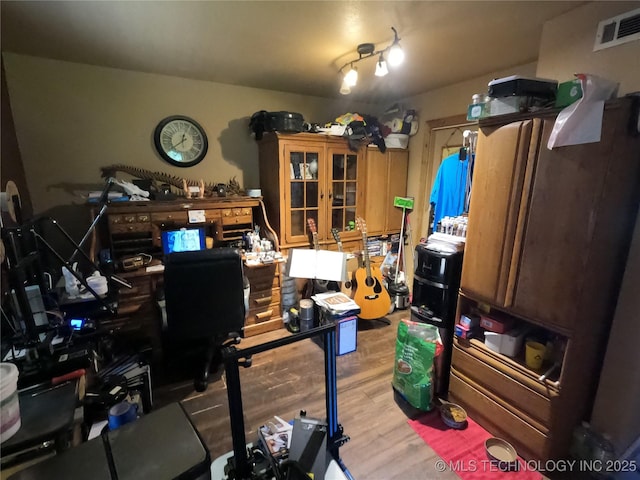 808 N Norfolk Rd, Yale, OK 74085 - office area featuring wood finished floors