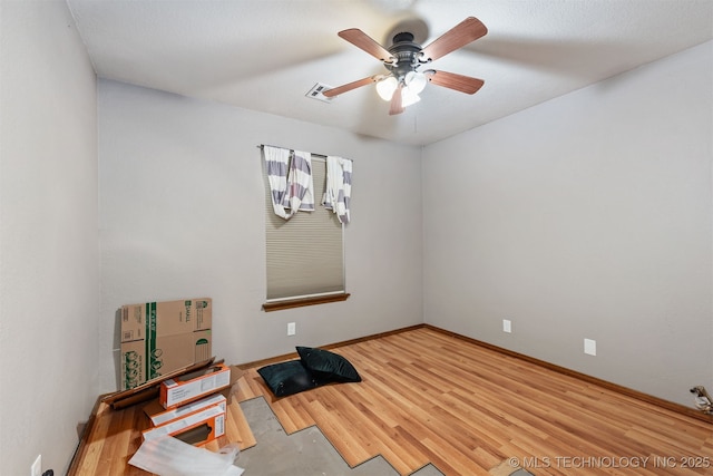 18268 S 79th E Ave, Bixby, OK 74008 - spare room with ceiling fan, light wood finished floors, and baseboards