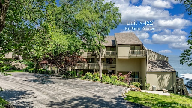 29898 S 566th Rd Unit 422, Afton, OK 74331 - view of property featuring uncovered parking
