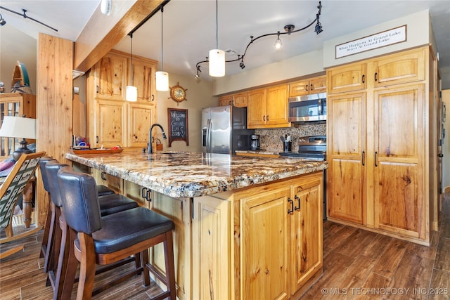 29898 S 566th Rd Unit 422, Afton, OK 74331 - kitchen featuring appliances with stainless steel finishes, dark wood-type flooring, decorative backsplash, and light stone counters