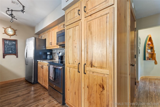 29898 S 566th Rd Unit 422, Afton, OK 74331 - kitchen featuring stainless steel appliances, dark wood-style floors, rail lighting, and baseboards