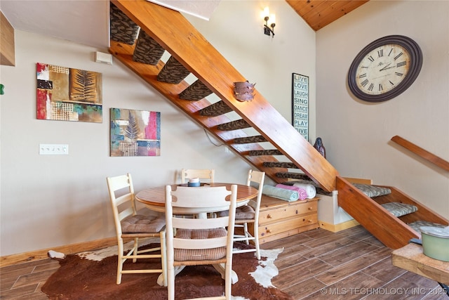 29898 S 566th Rd Unit 422, Afton, OK 74331 - dining area featuring stairs, wood finish floors, and baseboards