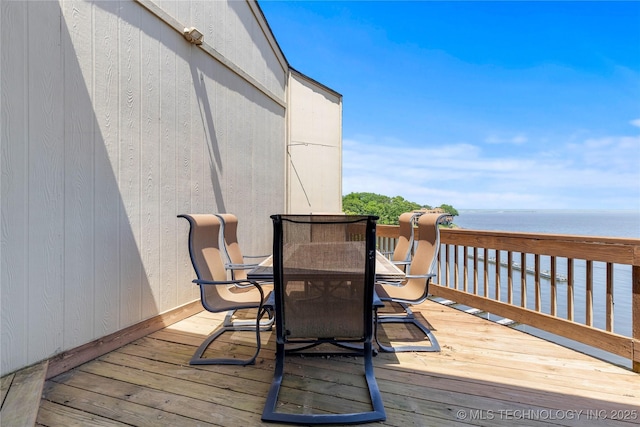 29898 S 566th Rd Unit 422, Afton, OK 74331 - wooden terrace with outdoor dining space and a water view