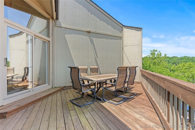 29898 S 566th Rd Unit 422, Afton, OK 74331 - wooden deck featuring outdoor dining area