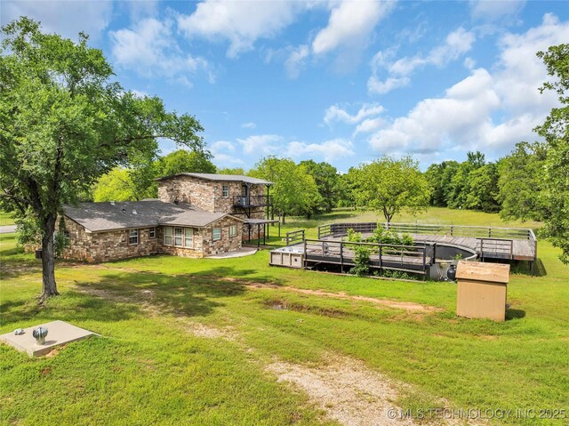 2382 Cheek, Lone Grove, OK 73443 - view of home's community with a yard and a deck