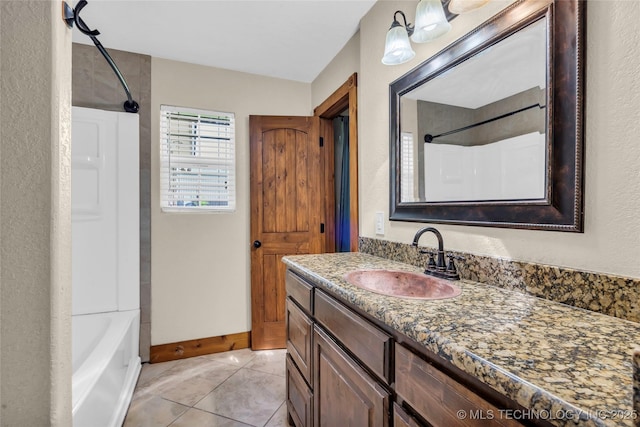 2382 Cheek, Lone Grove, OK 73443 - full bathroom with vanity, tile patterned flooring, a textured wall, and shower / bath combination
