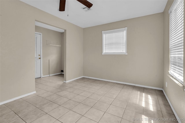 2382 Cheek, Lone Grove, OK 73443 - spare room with ceiling fan, plenty of natural light, and light tile patterned flooring