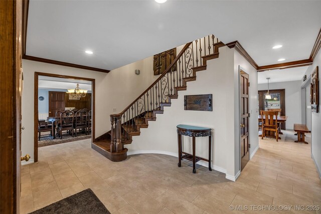 9417 S Gary Ave, Tulsa, OK 74137 - foyer entrance featuring a chandelier, crown molding, stairway, recessed lighting, and baseboards