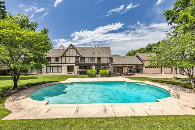 9417 S Gary Ave, Tulsa, OK 74137 - outdoor pool with a yard and a patio area