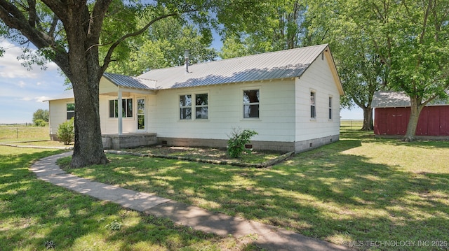 7941 N 433rd Rd, Adair, OK 74330 - view of front of property featuring a front yard, metal roof, and crawl space