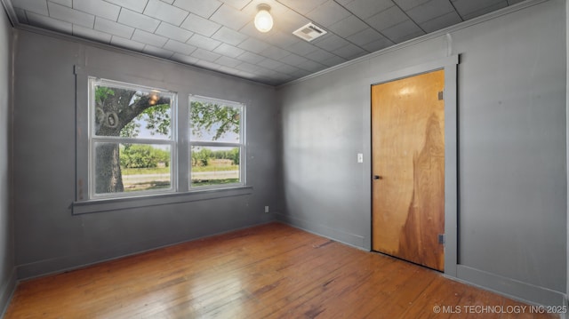 7941 N 433rd Rd, Adair, OK 74330 - empty room with crown molding, hardwood / wood-style floors, and baseboards