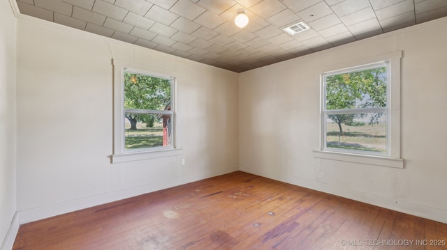 7941 N 433rd Rd, Adair, OK 74330 - unfurnished room with ornamental molding, hardwood / wood-style floors, and baseboards