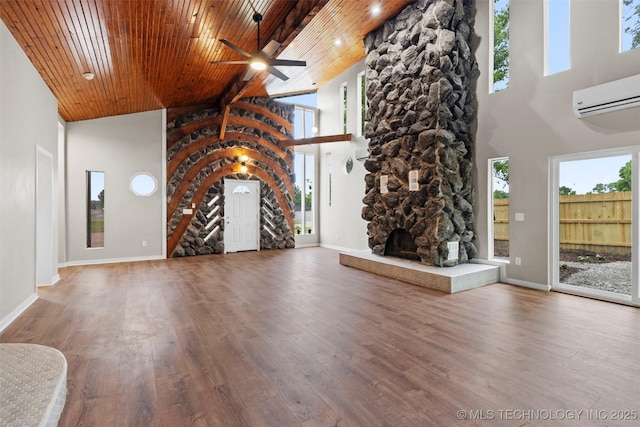 1550 E Apache St N, Tulsa, OK 74106 - unfurnished living room with high vaulted ceiling, a ceiling fan, wood finished floors, baseboards, and healthy amount of natural light