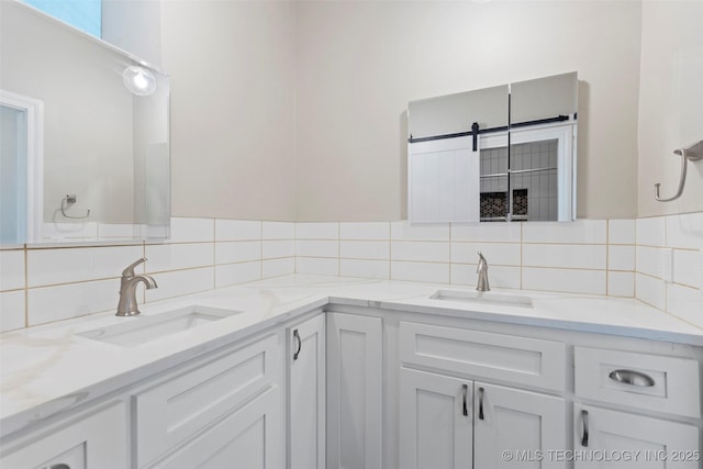 1550 E Apache St N, Tulsa, OK 74106 - bathroom featuring decorative backsplash and double vanity