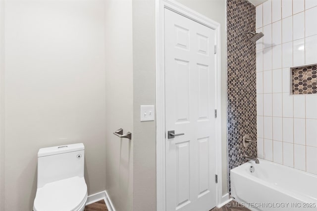 1550 E Apache St N, Tulsa, OK 74106 - bathroom with toilet, shower / tub combination, and baseboards