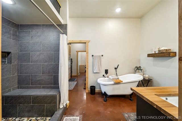17784 S 210th Rd, Okmulgee, OK 74447 - bathroom featuring concrete floors, tiled shower, a soaking tub, vanity, and a tile fireplace