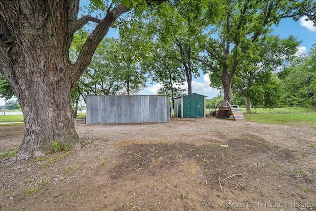 17784 S 210th Rd, Okmulgee, OK 74447 - view of yard featuring an outdoor structure and an outbuilding