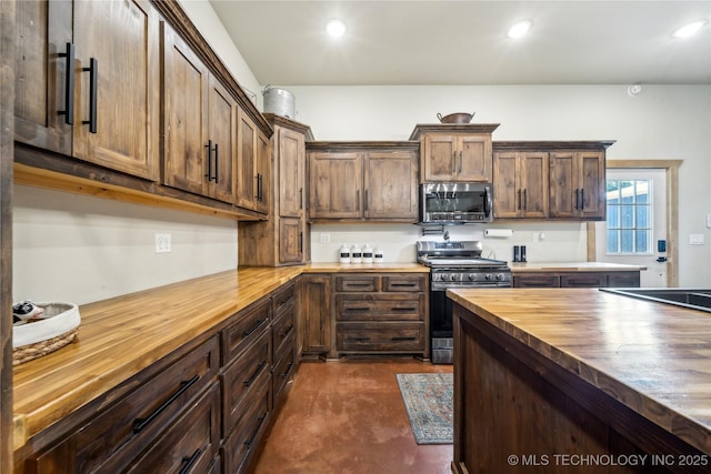 17784 S 210th Rd, Okmulgee, OK 74447 - kitchen featuring wood counters, appliances with stainless steel finishes, finished concrete floors, recessed lighting, and a sink