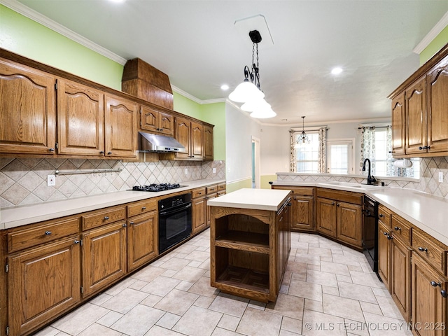 8704 N 140th E Ct, Owasso, OK 74055 - kitchen with black appliances, a sink, under cabinet range hood, ornamental molding, and recessed lighting