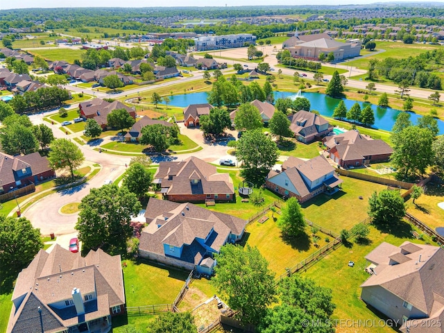 8704 N 140th E Ct, Owasso, OK 74055 - aerial view of residential area featuring a large body of water