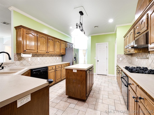8704 N 140th E Ct, Owasso, OK 74055 - kitchen featuring a sink, black appliances, under cabinet range hood, crown molding, and a center island