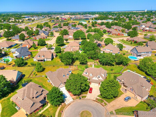 8704 N 140th E Ct, Owasso, OK 74055 - aerial perspective of suburban area