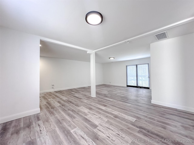 2212 W Independence Pl, Tulsa, OK 74127 - unfurnished room featuring light wood-style floors and baseboards