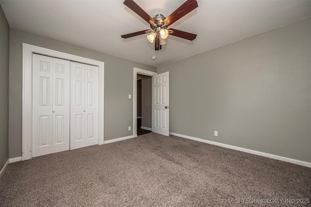 423 E Cherry St, Cushing, OK 74023 - unfurnished bedroom featuring carpet flooring, baseboards, a closet, and ceiling fan