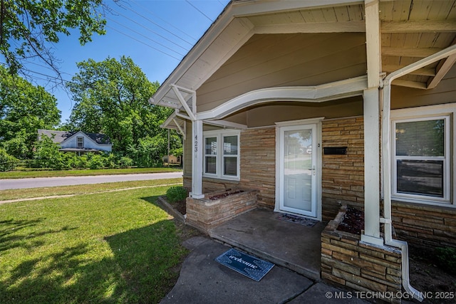 423 E Cherry St, Cushing, OK 74023 - doorway to property with a lawn