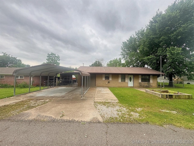 510 Beverly Ave, Vian, OK 74962 - view of front facade featuring a carport, driveway, and metal roof