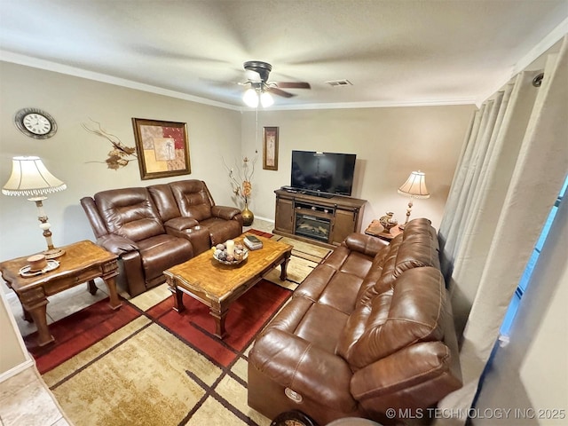 510 Beverly Ave, Vian, OK 74962 - living room featuring ceiling fan, crown molding, and baseboards