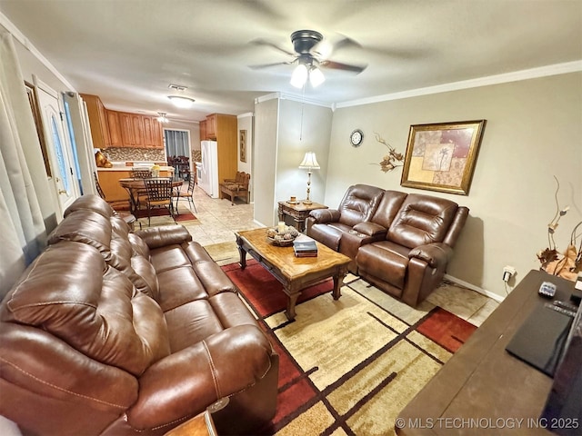 510 Beverly Ave, Vian, OK 74962 - living room with a ceiling fan, ornamental molding, light tile patterned floors, and baseboards