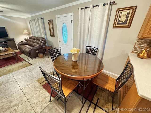 510 Beverly Ave, Vian, OK 74962 - dining space with ornamental molding and light tile patterned floors