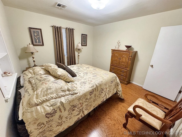 510 Beverly Ave, Vian, OK 74962 - bedroom with light wood-style floors