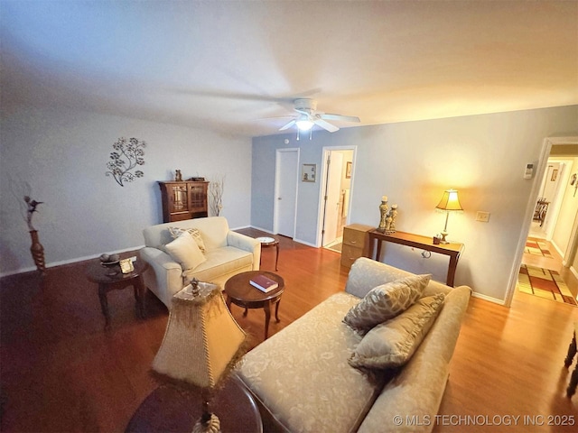 510 Beverly Ave, Vian, OK 74962 - living area with ceiling fan, wood finished floors, and baseboards