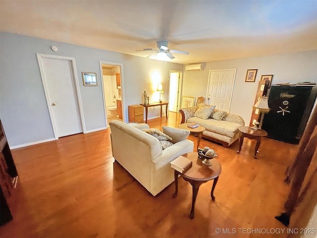 510 Beverly Ave, Vian, OK 74962 - living area featuring a wall mounted AC and a ceiling fan