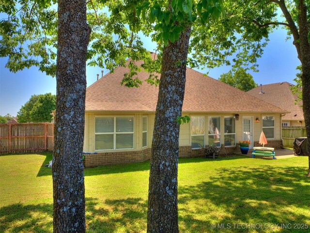 2008 N 8th St, Broken Arrow, OK 74012 - view of front of house featuring roof with shingles, a patio, and brick siding