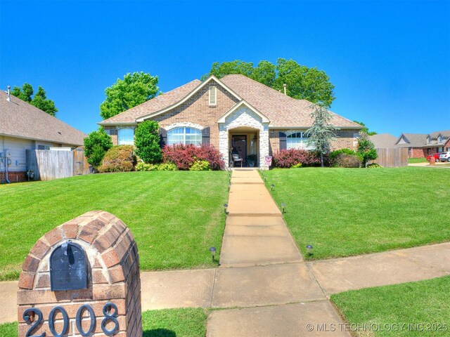 2008 N 8th St, Broken Arrow, OK 74012 - view of front of house with brick siding and a shingled roof