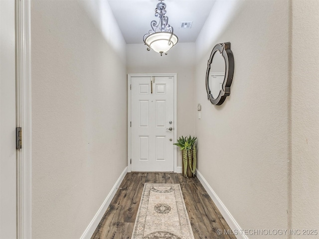 2008 N 8th St, Broken Arrow, OK 74012 - entryway with dark wood-type flooring and baseboards
