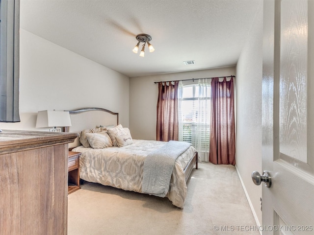 2008 N 8th St, Broken Arrow, OK 74012 - carpeted bedroom with baseboards