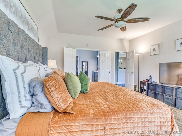 2008 N 8th St, Broken Arrow, OK 74012 - bedroom featuring wood finished floors and a ceiling fan