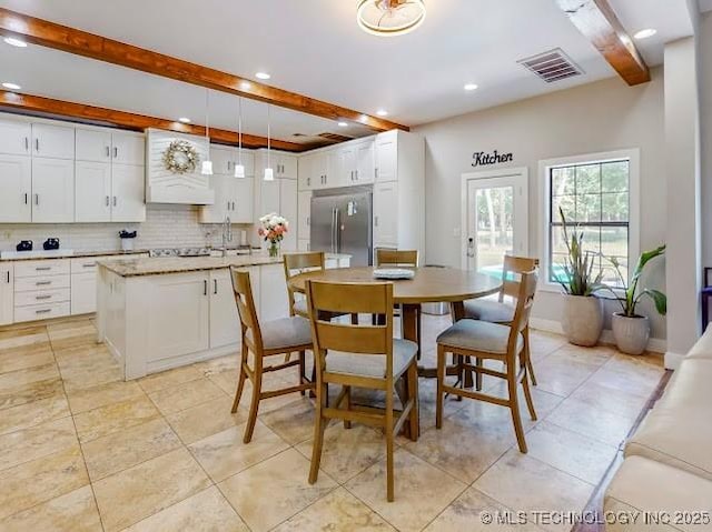 17716 S 39th W Ave, Mounds, OK 74047 - dining room with beam ceiling, recessed lighting, and light tile patterned floors