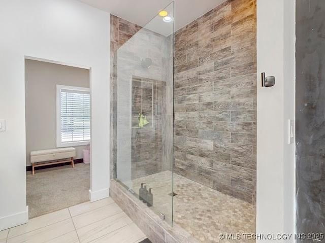 17716 S 39th W Ave, Mounds, OK 74047 - bathroom with a tile shower, tile patterned floors, and baseboards