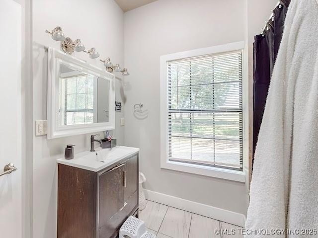 17716 S 39th W Ave, Mounds, OK 74047 - full bath featuring plenty of natural light, baseboards, and vanity