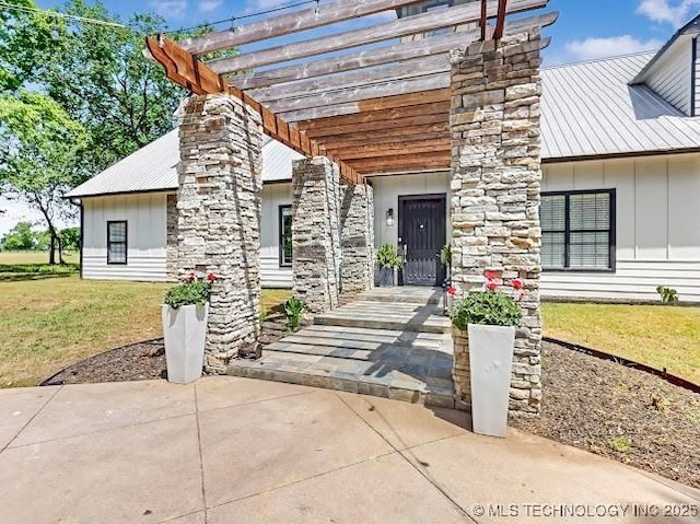 17716 S 39th W Ave, Mounds, OK 74047 - view of front of home featuring a chimney, a front yard, a pergola, and board and batten siding