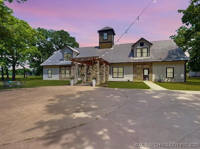 17716 S 39th W Ave, Mounds, OK 74047 - view of front facade featuring stone siding and a yard