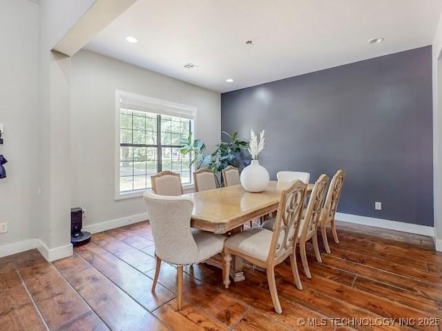 17716 S 39th W Ave, Mounds, OK 74047 - dining room with hardwood / wood-style floors, a wood stove, baseboards, and recessed lighting