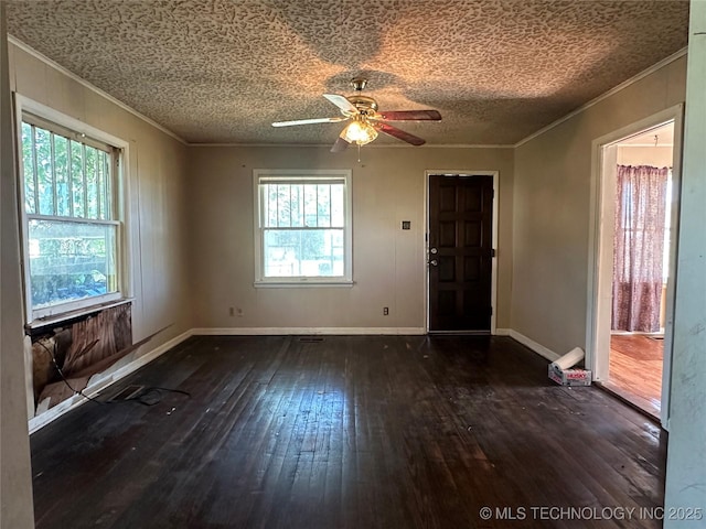 1107 W Broadway St, Henryetta, OK 74437 - empty room with ornamental molding, hardwood / wood-style flooring, a ceiling fan, a textured ceiling, and baseboards